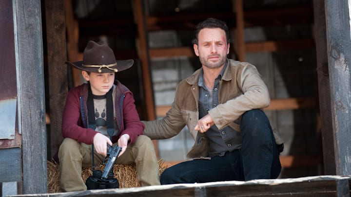 Carl Grimes (Chandler Riggs) and Rick Grimes (Andrew Lincoln) - The Walking Dead - Season 2, Episode 12 - Photo Credit: Gene Page/AMC