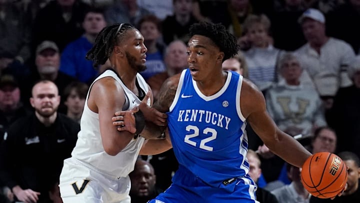 Kentucky Wildcats center Amari Williams (22) is guarded by Vanderbilt Commodores forward Devin McGlockton (99) during their game at Memorial Gym in Nashville, Tenn., Thursday, Aug. 29, 2024.
