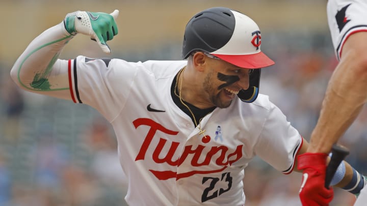 Jun 16, 2024; Minneapolis, Minnesota, USA; Minnesota Twins third baseman Royce Lewis (23) celebrates his three-run home run against the Oakland Athletics in the first inning of game two of a double header at Target Field. Mandatory Credit: Bruce Kluckhohn-USA TODAY Sports