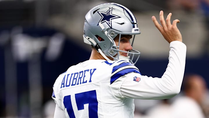 Sep 14, 2025; Arlington, Texas, USA;  Dallas Cowboys place kicker Brandon Aubrey (17) reacts before the game against the New York Giants at AT&T Stadium. 