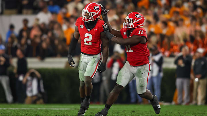Nov 16, 2024; Athens, Georgia, USA; Georgia Bulldogs linebacker Smael Mondon Jr. (2) celebrates with linebacker Jalon Walker (11) after a tackle against the Tennessee Volunteers in the second quarter at Sanford Stadium. Mandatory Credit: Brett Davis-Imagn Images
Nov 16, 2024; Athens, Georgia, USA; Georgia Bulldogs linebacker Smael Mondon Jr. (2) celebrates with linebacker Jalon Walker (11) after a tackle against the Tennessee Volunteers in the second quarter at Sanford Stadium. Mandatory Credit: Brett Davis-Imagn Images