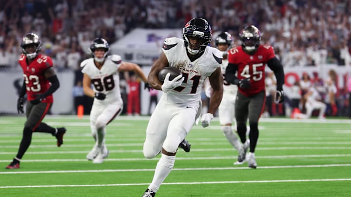 Sep 15, 2025; Houston, Texas, USA;Houston Texans running back Nick Chubb (21) rushes the ball for a touchdown during the fourth quarter against the Tampa Bay Buccaneers at NRG Stadium. Mandatory Credit: Thomas Shea-Imagn Images