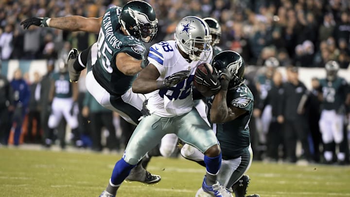 Dec 14, 2014; Philadelphia, PA, USA; Dallas Cowboys wide receiver Dez Bryant (88) is tackled by