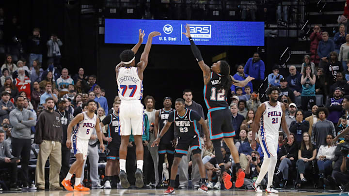 Dec 30, 2025; Memphis, Tennessee, USA; Philadelphia 76ers guard VJ Edgecombe (77) hit a game winning three over Memphis Grizzlies guard Ja Morant (12) during overtime at FedExForum. Mandatory Credit: Petre Thomas-Imagn Images Dec 30, 2025; Memphis, Tennessee, USA; Philadelphia 76ers guard VJ Edgecombe (77) hit a game winning three over Memphis Grizzlies guard Ja Morant (12) during overtime at FedExForum. Mandatory Credit: Petre Thomas-Imagn Images