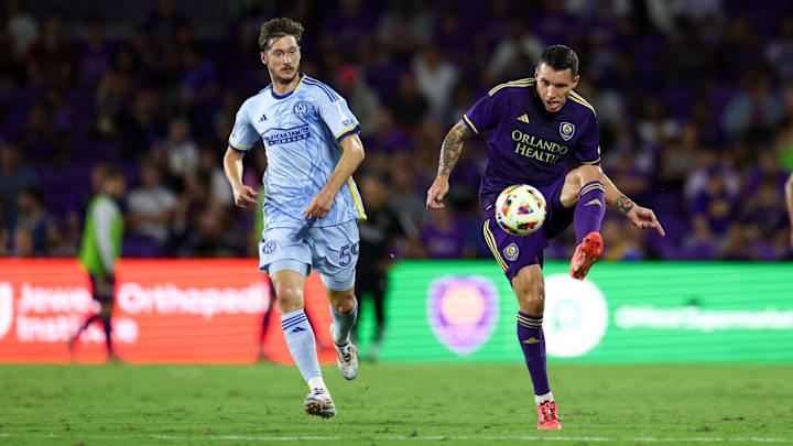 Oct 19, 2024; Orlando, Florida, USA; Orlando City defender Kyle Smith (24) controls the ball against Atlanta United in the second half at Inter&Co Stadium. Mandatory Credit: Nathan Ray Seebeck-Imagn Images