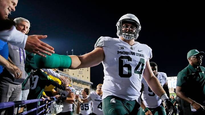 Sep 3, 2021; Evanston, Illinois, USA; Michigan State Spartans offensive lineman Matt Allen (64) celebrates their win over the Northwestern Wildcats at Ryan Field. The Michigan State Spartans won 38-21. Mandatory Credit: Jon Durr-USA TODAY Sports Sep 3, 2021; Evanston, Illinois, USA; Michigan State Spartans offensive lineman Matt Allen (64) celebrates their win over the Northwestern Wildcats at Ryan Field. The Michigan State Spartans won 38-21. Mandatory Credit: Jon Durr-USA TODAY Sports