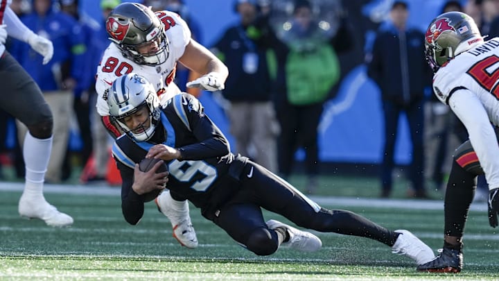 Jan 7, 2024; Charlotte, North Carolina, USA; Tampa Bay Buccaneers linebacker Yaya Diaby (90) sacks Carolina Panthers quarterback Bryce Young (9) during the second half at Bank of America Stadium. Mandatory Credit: Jim Dedmon-Imagn Images Jan 7, 2024; Charlotte, North Carolina, USA; Tampa Bay Buccaneers linebacker Yaya Diaby (90) sacks Carolina Panthers quarterback Bryce Young (9) during the second half at Bank of America Stadium. Mandatory Credit: Jim Dedmon-Imagn Images