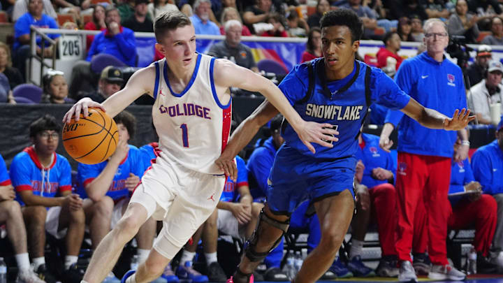Turner Armstrong (1) and the Coolidge boys basketball team competed against Snowflake in an AIA Class 3A semifinal game at Arizona Veterans Memorial Coliseum in Phoenix in February. An Arizona judge temporarily lifted the Bears' probation to allow them to compete in the state tournament. At that time, Coolidge's athletic department was still barred from the postseason.