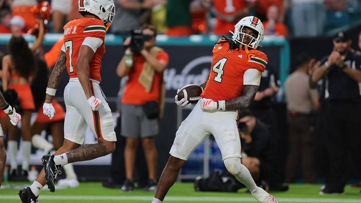 Sep 13, 2025; Miami Gardens, Florida, USA; Miami Hurricanes running back Mark Fletcher Jr. (4) celebrates after scoring a touchdown against the South Florida Bulls during the second quarter at Hard Rock Stadium. Mandatory Credit: Sam Navarro-Imagn Images Sep 13, 2025; Miami Gardens, Florida, USA; Miami Hurricanes running back Mark Fletcher Jr. (4) celebrates after scoring a touchdown against the South Florida Bulls during the second quarter at Hard Rock Stadium. Mandatory Credit: Sam Navarro-Imagn Images