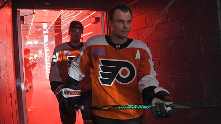 Jan 7, 2025; Philadelphia, Pennsylvania, USA; Philadelphia Flyers center Scott Laughton (21) walks to the ice for warmups against the Toronto Maple Leafs at Wells Fargo Center.