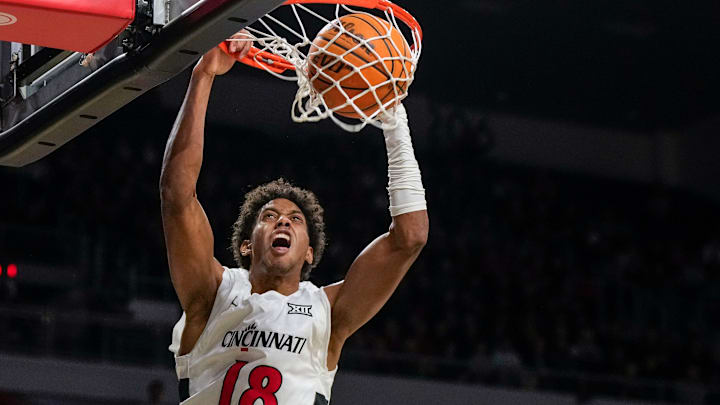 Cincinnati Bearcats forward Baba Miller (18) dunks in the first half of the NCAA men’s basketball game between the Cincinnati Bearcats and the Western Carolina Catamounts at Fifth Third Arena in Cincinnati on Monday, Nov. 3, 2025. Cincinnati Bearcats forward Baba Miller (18) dunks in the first half of the NCAA men’s basketball game between the Cincinnati Bearcats and the Western Carolina Catamounts at Fifth Third Arena in Cincinnati on Monday, Nov. 3, 2025.