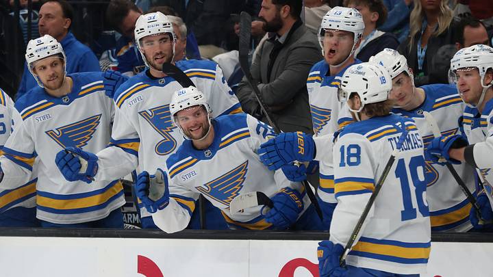Apr 16, 2026; Salt Lake City, Utah, USA; St. Louis Blues center Robert Thomas (18) celebrates with teammates after scoring a goal against the Utah Mammoth during the second period at Delta Center. Mandatory Credit: Rob Gray-Imagn Images Apr 16, 2026; Salt Lake City, Utah, USA; St. Louis Blues center Robert Thomas (18) celebrates with teammates after scoring a goal against the Utah Mammoth during the second period at Delta Center. Mandatory Credit: Rob Gray-Imagn Images