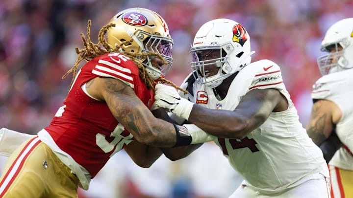 Dec 17, 2023; Glendale, Arizona, USA; San Francisco 49ers defensive end Chase Young (92) against Arizona Cardinals offensive lineman D.J. Humphries (74) at State Farm Stadium. Mandatory Credit: Mark J. Rebilas-Imagn Images