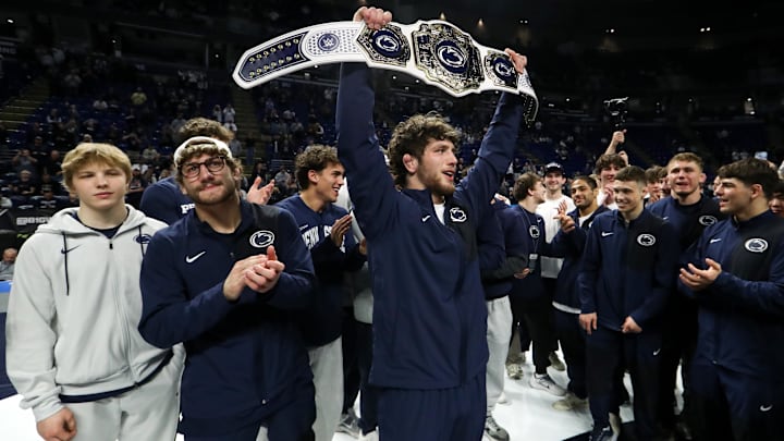 Mar 8, 2026; University Park, PA, USA; Penn State Nittany Lions Levi Haines raises the championship belt after winning the team championship following the finals of the Big Ten Wrestling Championships at Bryce Jordan Center. Mandatory Credit: Matthew O'Haren-Imagn Images Mar 8, 2026; University Park, PA, USA; Penn State Nittany Lions Levi Haines raises the championship belt after winning the team championship following the finals of the Big Ten Wrestling Championships at Bryce Jordan Center. Mandatory Credit: Matthew O'Haren-Imagn Images