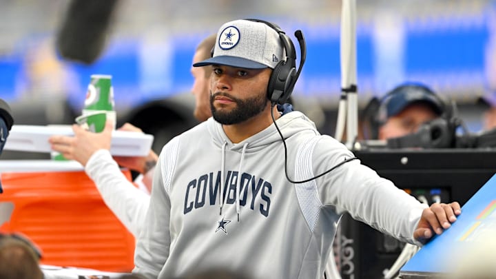 Dallas Cowboys quarterback Dak Prescott on the bench in the second half against the Los Angeles Rams at SoFi Stadium.