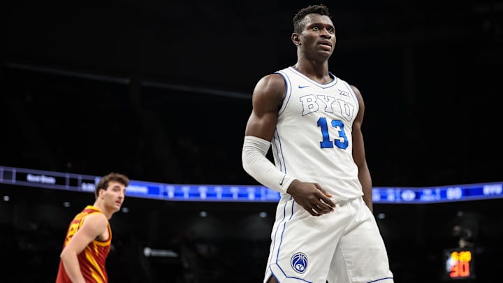 Mar 13, 2025; Kansas City, MO, USA; Brigham Young Cougars center Keba Keita (13) reacts after a play during the second half against the Iowa State Cyclones at T-Mobile Center. Mandatory Credit: William Purnell-Imagn Images Mar 13, 2025; Kansas City, MO, USA; Brigham Young Cougars center Keba Keita (13) reacts after a play during the second half against the Iowa State Cyclones at T-Mobile Center. Mandatory Credit: William Purnell-Imagn Images