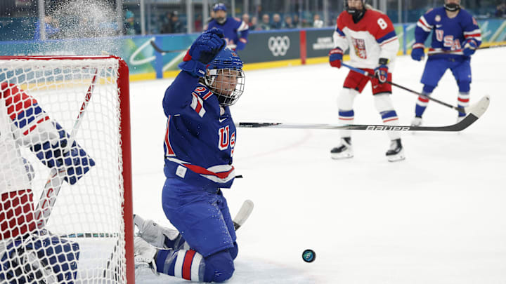 Feb 5, 2026; Milan, Italy; Hilary Knight (21) of Team United States celebrates after scoring a goal against Team Czechia in women's ice hockey Group A play during the Milano Cortina 2026 Olympic Winter Games at Milano Rho Ice Hockey Arena. 