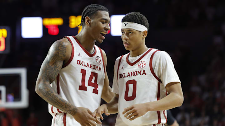 Oklahoma forward Jalon Moore (14) and guard Jeremiah Fears 