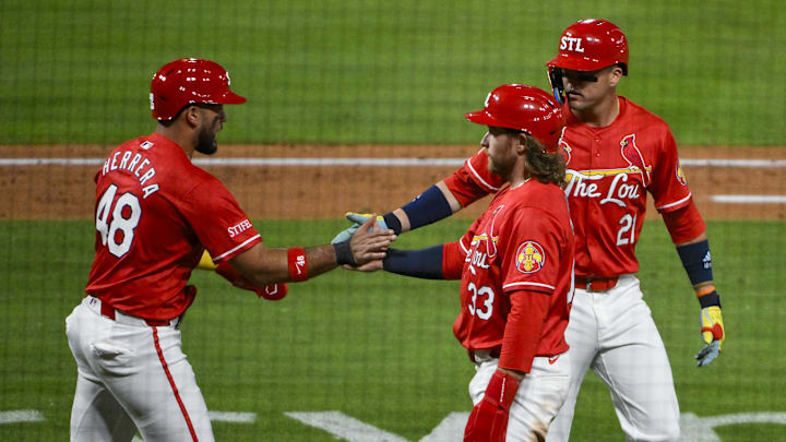 May 23, 2025; St. Louis, Missouri, USA; St. Louis Cardinals designated hitter Ivan Herrera (48) right fielder Lars Nootbaar (21) and left fielder Brendan Donovan (33) celebrate after they scored on a three run triple by third baseman Nolan Arenado (not pictured) during the sixth inning against the Arizona Diamondbacks at Busch Stadium. Mandatory Credit: Jeff Curry-Imagn Images May 23, 2025; St. Louis, Missouri, USA; St. Louis Cardinals designated hitter Ivan Herrera (48) right fielder Lars Nootbaar (21) and left fielder Brendan Donovan (33) celebrate after they scored on a three run triple by third baseman Nolan Arenado (not pictured) during the sixth inning against the Arizona Diamondbacks at Busch Stadium. Mandatory Credit: Jeff Curry-Imagn Images