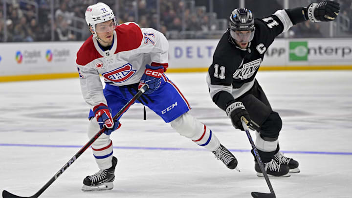 Feb 5, 2025; Los Angeles, California, USA;Montreal Canadiens center Jake Evans (71) and Los Angeles Kings center Anze Kopitar (11) chase down the puck in the second period at Crypto.com Arena. Mandatory Credit: Jayne Kamin-Oncea-Imagn Images Feb 5, 2025; Los Angeles, California, USA;Montreal Canadiens center Jake Evans (71) and Los Angeles Kings center Anze Kopitar (11) chase down the puck in the second period at Crypto.com Arena. Mandatory Credit: Jayne Kamin-Oncea-Imagn Images