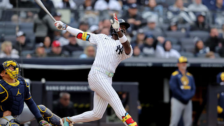 Mar 30, 2025; Bronx, New York, USA; New York Yankees second baseman Jazz Chisholm Jr. (13) follows through on a three run home run against the Milwaukee Brewers during the seventh inning at Yankee Stadium. Mar 30, 2025; Bronx, New York, USA; New York Yankees second baseman Jazz Chisholm Jr. (13) follows through on a three run home run against the Milwaukee Brewers during the seventh inning at Yankee Stadium.
