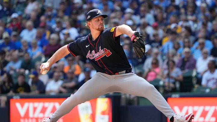 Jun 11, 2025; Milwaukee, Wisconsin, USA; Atlanta Braves pitcher Spencer Schwellenbach (56) delivers a pitch against the Milwaukee Brewers in the sixth inning at American Family Field. Mandatory Credit: Michael McLoone-Imagn Images