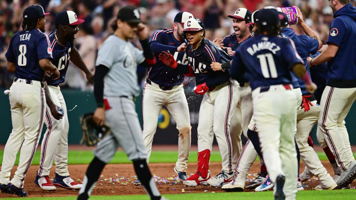 Jul 2, 2024; Cleveland, Ohio, USA; Cleveland Guardians pinch hitter Bo Naylor, middle celebrates with teammates as Chicago White Sox second baseman Nicky Lopez (8) walks off the field after Naylor hit a walk off sacrifice fly during the ninth inning against the Chicago White Sox at Progressive Field. Mandatory Credit: Ken Blaze-USA TODAY Sports Jul 2, 2024; Cleveland, Ohio, USA; Cleveland Guardians pinch hitter Bo Naylor, middle celebrates with teammates as Chicago White Sox second baseman Nicky Lopez (8) walks off the field after Naylor hit a walk off sacrifice fly during the ninth inning against the Chicago White Sox at Progressive Field. Mandatory Credit: Ken Blaze-USA TODAY Sports
