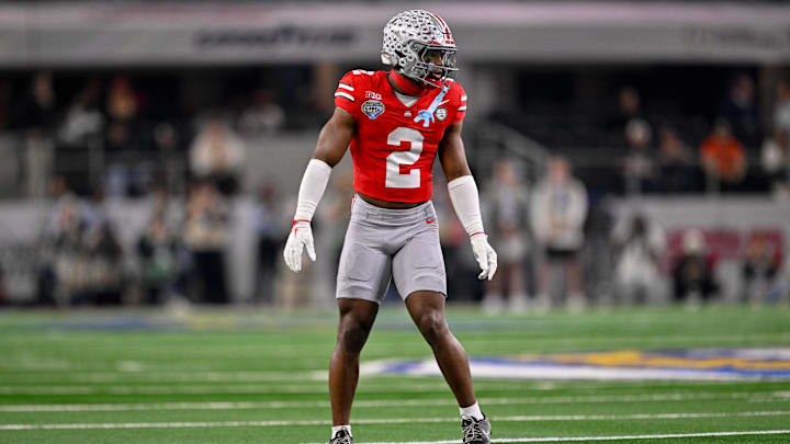 Ohio State Buckeyes safety Caleb Downs (2) gets into position during the 2025 Cotton Bowl and quarterfinal game of the College Football Playoff at AT&T Stadium.