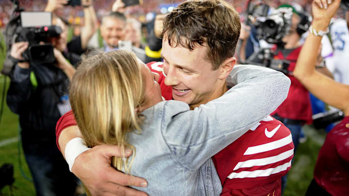 San Francisco 49ers quarterback Brock Purdy (13) kisses his then-fiancee Jenna Brandt after winning the NFC Championship football game against the Detroit Lions at Levi's Stadium.