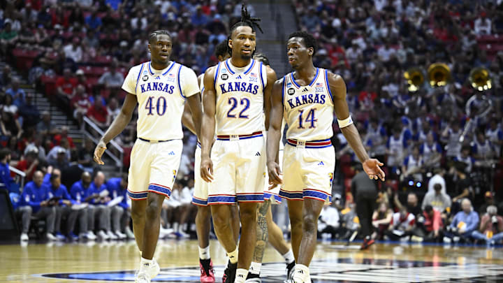Mar 22, 2026; San Diego, CA, USA; Kansas Jayhawks forward Flory Bidunga (40) and guard Darryn Peterson (22) and guard Melvin Council Jr. (14) look on in the first half against the St. John's Red Storm during a second round game of the men's 2026 NCAA Tournament at Viejas Arena. Mandatory Credit: Denis Poroy-Imagn Images