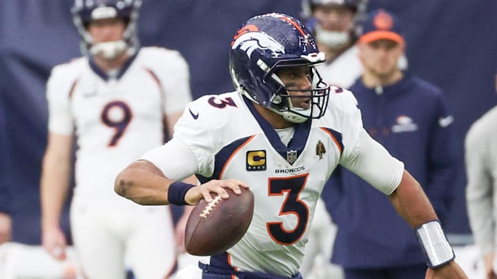 Dec 3, 2023; Houston, Texas, USA; Denver Broncos quarterback Russell Wilson (3) scrambles against