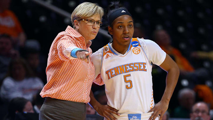 Mar 21, 2015; Knoxville, TN, USA; Tennessee Lady Volunteers head coach Holly Warlick talks to guard Ariel Massengale (5) in the first round of the women's NCAA Tournament against the Boise State Broncos at Thompson-Boling Arena. Tennessee won 72 to 61. Mandatory Credit: Randy Sartin-Imagn Images