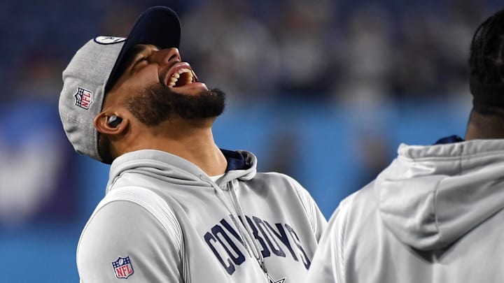Dec 29, 2022; Nashville, Tennessee, USA; Dallas Cowboys quarterback Dak Prescott (4) and running back Ezekiel Elliott (21) laugh during warmups before the game against the Tennessee Titans at Nissan Stadium. Mandatory Credit: Christopher Hanewinckel-Imagn Images