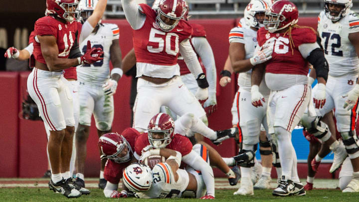 Auburn running back Jarquez Hunter (27) is stopped during an Alabama goal line stand at the end of the first half on Nov. 30, 2024.
