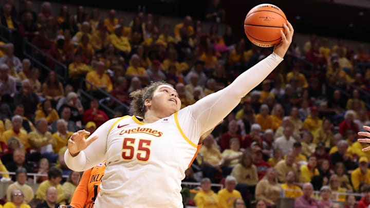 Feb 25, 2026; Ames, Iowa, USA; Iowa State Cyclones center Audi Crooks (55) grabs a rebound during their game with the Oklahoma State Cowboys in the first half at James H. Hilton Coliseum.
