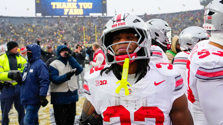 Ohio State Buckeyes running back Isaiah West (32) celebrates after defeating the Michigan Wolverines in the NCAA football game at Michigan Stadium on Saturday, Nov. 29, 2025 in Ann Arbor, Michigan.