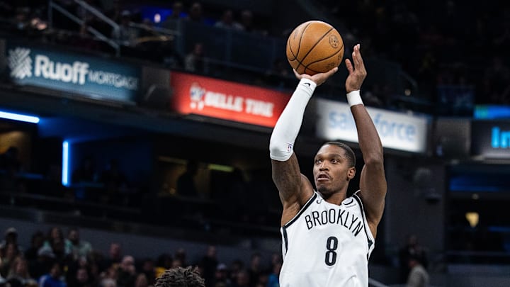Mar 16, 2024; Indianapolis, Indiana, USA; Brooklyn Nets guard Lonnie Walker IV (8) shoots the ball while Indiana Pacers guard Ben Sheppard (26) defends in the second half at Gainbridge Fieldhouse. Mandatory Credit: Trevor Ruszkowski-Imagn Images