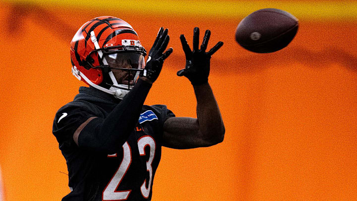 Cincinnati Bengals safety Dax Hill (23) catches a pass during an interception drill at Bengals spring practice at the IEL Indoor Facility in Cincinnati on Wednesday, June 12, 2024.
