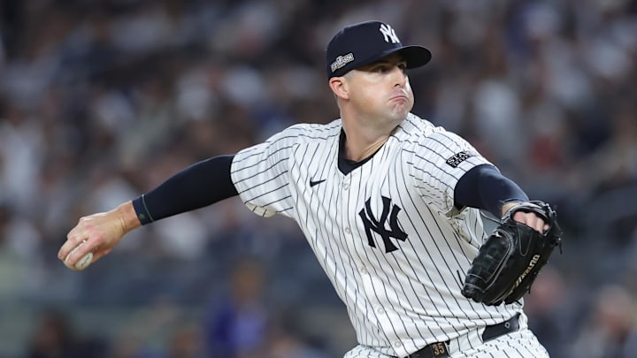 Oct 5, 2024; Bronx, New York, USA; New York Yankees pitcher Clay Holmes (35) pitches during the sixth inning against the Kansas City Royals during game one of the ALDS for the 2024 MLB Playoffs at Yankee Stadium. Mandatory Credit: Brad Penner-Imagn Images