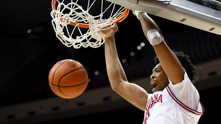 Feb 9, 2026; Bloomington, Indiana, USA; Indiana Hoosiers forward Sam Alexis (4) dunks the ball against the Oregon Ducks during the first half at Simon Skjodt Assembly Hall.