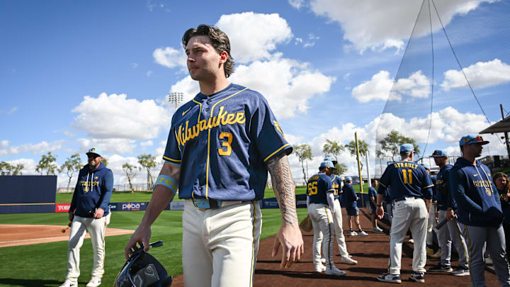 Milwaukee Brewers infield prospect Andrew Fischer walks across the field during spring training workouts Tuesday, February 17, 2026, at American Family Fields of Phoenix in Phoenix, Arizona.