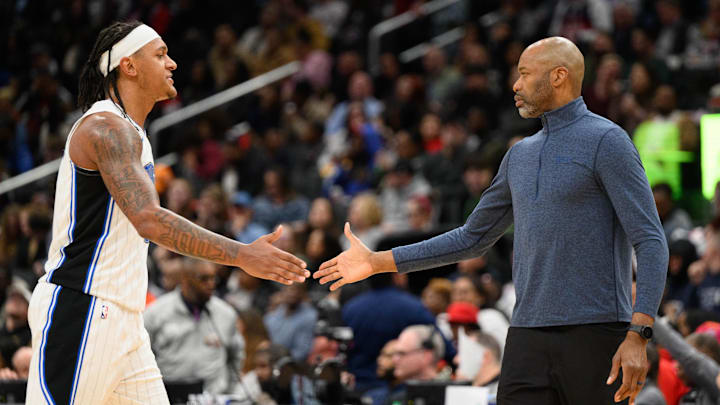 Mar 21, 2025; Washington, District of Columbia, USA; Orlando Magic forward Paolo Banchero (5) and head coach Jamahl Mosley react during the second quarter against the Washington Wizards at Capital One Arena. Mandatory Credit: Reggie Hildred-Imagn Images