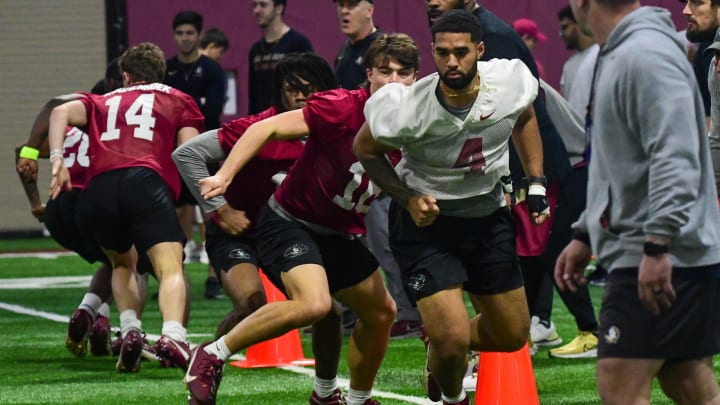 Florida State football quarterback DJ Uiagalelei and other quarterbacks take part in the final Tour of Duty winter workouts ahead of 2024 spring practices on Thursday, March 7, 2024.