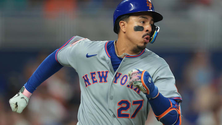 Sep 28, 2025; Miami, Florida, USA; New York Mets designated hitter Mark Vientos (27) runs toward first base after hitting a single against the Miami Marlins during the sixth inning at loanDepot Park. Mandatory Credit: Sam Navarro-Imagn Images