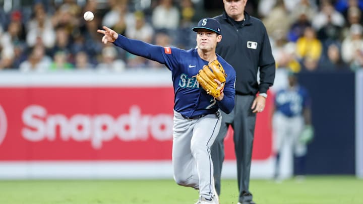 Cole Young (2) throws to first base during the eighth inning against the San Diego Padres at Petco Park. 