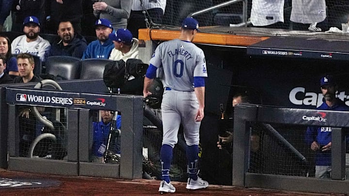 Oct 30, 2024; New York, New York, USA; Los Angeles Dodgers pitcher Jack Flaherty (0) walks to the dugout after being relieved during the second inning against the New York Yankees in game four of the 2024 MLB World Series at Yankee Stadium.