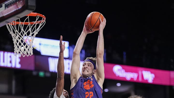 Feb 18, 2026; Winston-Salem, North Carolina, USA; Clemson Tigers center Carter Welling (22) makes a slam dunk during the second half against the Wake Forest Demon Deacons at Lawrence Joel Veterans Memorial Coliseum. Mandatory Credit: Jim Dedmon-Imagn Images