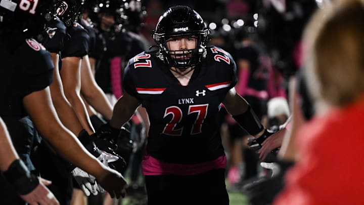 Brandon Valley linebacker Evan Gray (27) runs down as he is announced into the starting lineup on Friday, Oct. 18, 2024, at Brandon Valley High School in Brandon, South Dakota.