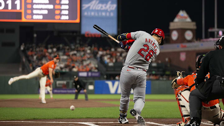 Sep 27, 2024; San Francisco, California, USA; St. Louis Cardinals third baseman Nolan Arenado (28) hits an RBI single off San Francisco Giants starting pitcher Landen Roupp (65) during the first inning at Oracle Park. Mandatory Credit: D. Ross Cameron-Imagn Images Sep 27, 2024; San Francisco, California, USA; St. Louis Cardinals third baseman Nolan Arenado (28) hits an RBI single off San Francisco Giants starting pitcher Landen Roupp (65) during the first inning at Oracle Park. Mandatory Credit: D. Ross Cameron-Imagn Images