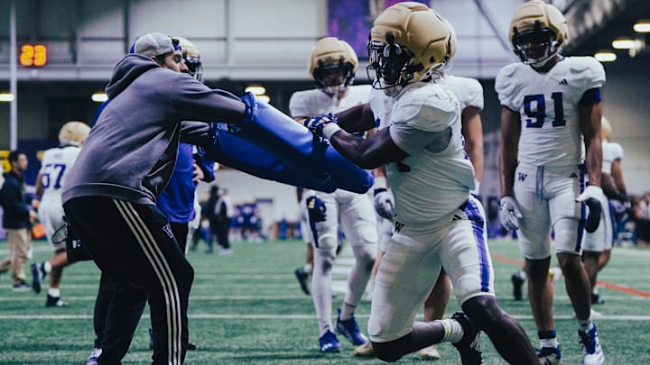 Senior edge rusher Milton Hopkins fights his way through a drill. Senior edge rusher Milton Hopkins fights his way through a drill.